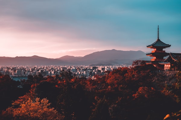Animated travel route video preview showing a Kyoto sunset stop on the map